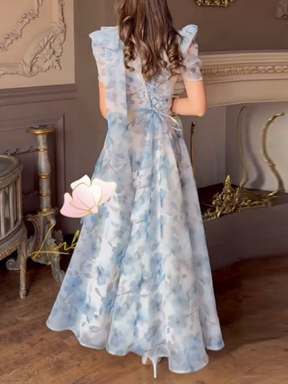 Elegant fitted printed dress with puff sleeves