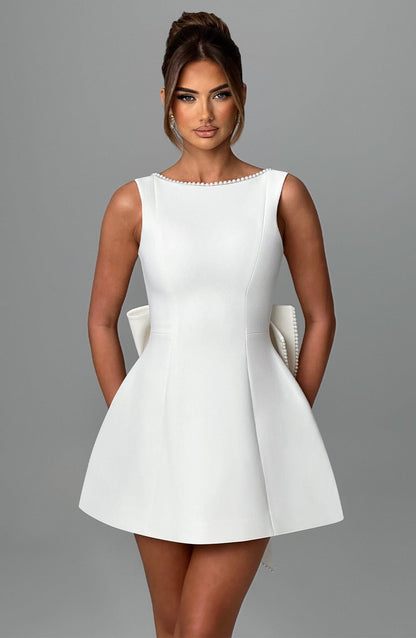 Hollis - Elegant Pearl Bow Mini Dress